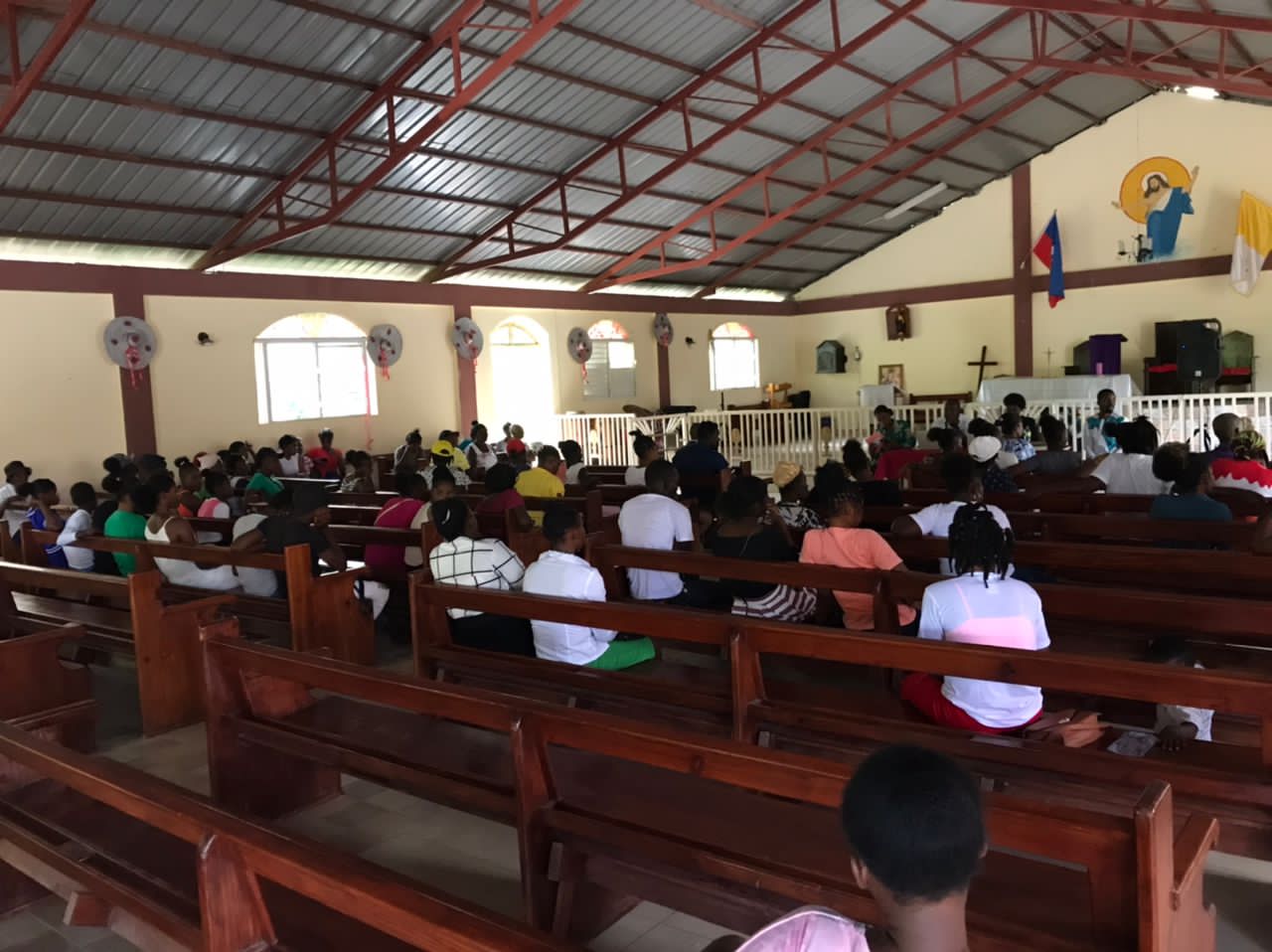 Community members gathered at a Vijend Haïti event